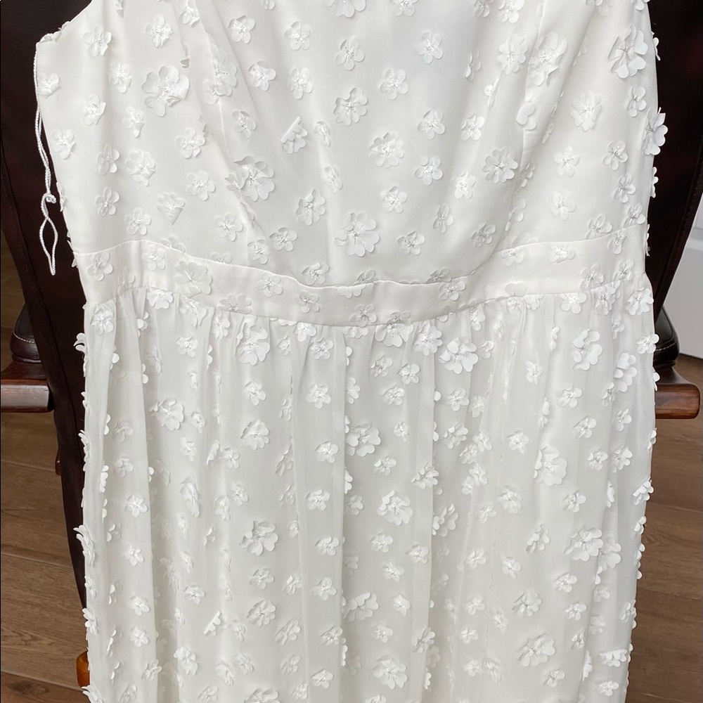 White knee length dress